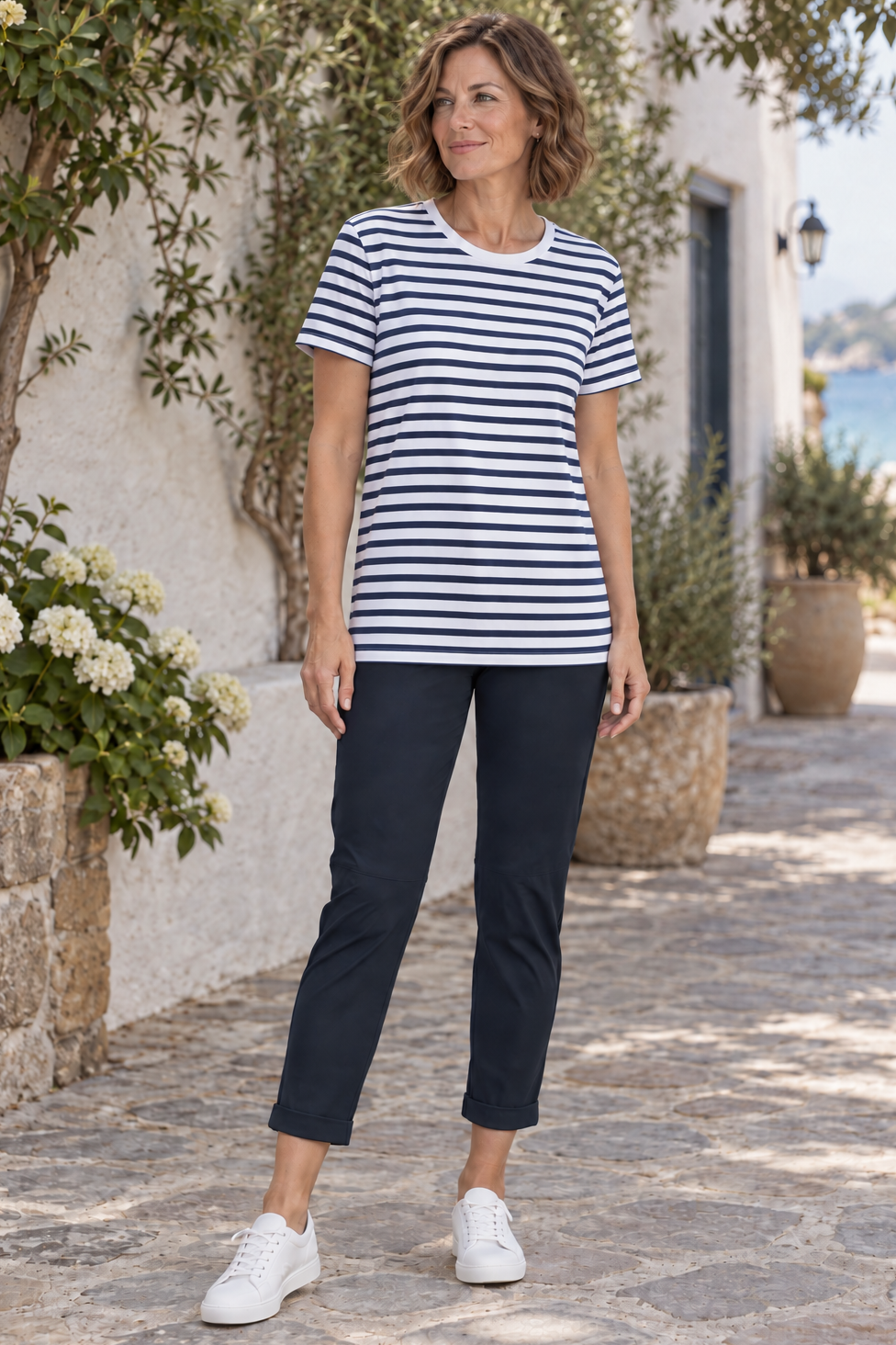 Navy Narrow Cuff Capri Pants styled with a long white shirt